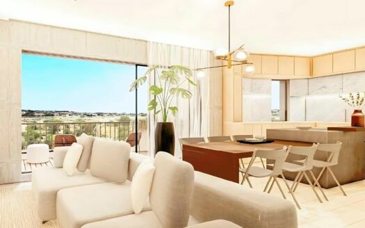 Interno moderno di un appartamento a Rabat, Malta, con un ampio soggiorno e sala da pranzo. La stanza ha un'estetica minimalista con mobili bianchi e in legno, e grandi finestre che offrono una vista panoramica.